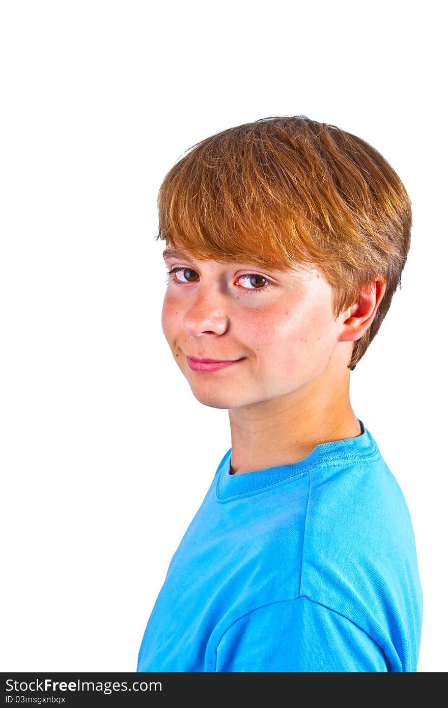 Portrait of happy boy with blue shirt in studio