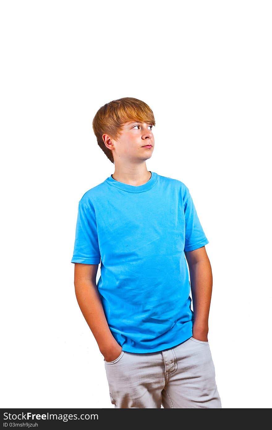 Portrait of happy boy with blue shirt in studio