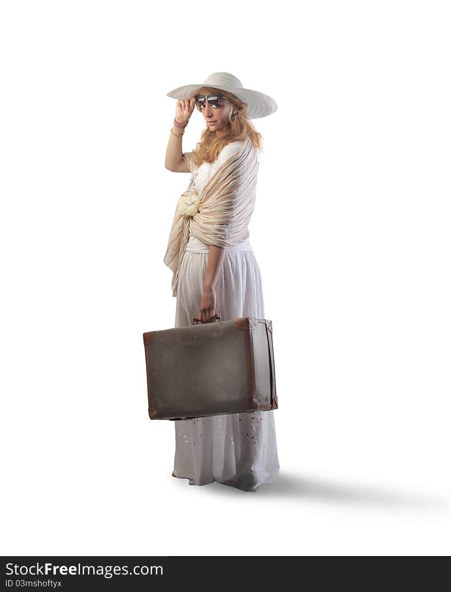 Beautiful woman holding a suitcase. Beautiful woman holding a suitcase