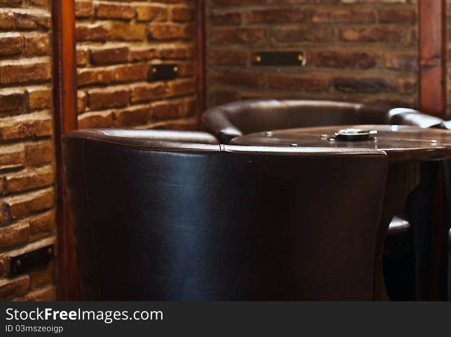 Elegant cafe interior with chair in focus