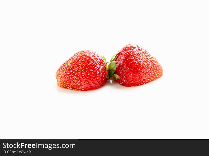 Two ripe strawberries on white background. Two ripe strawberries on white background