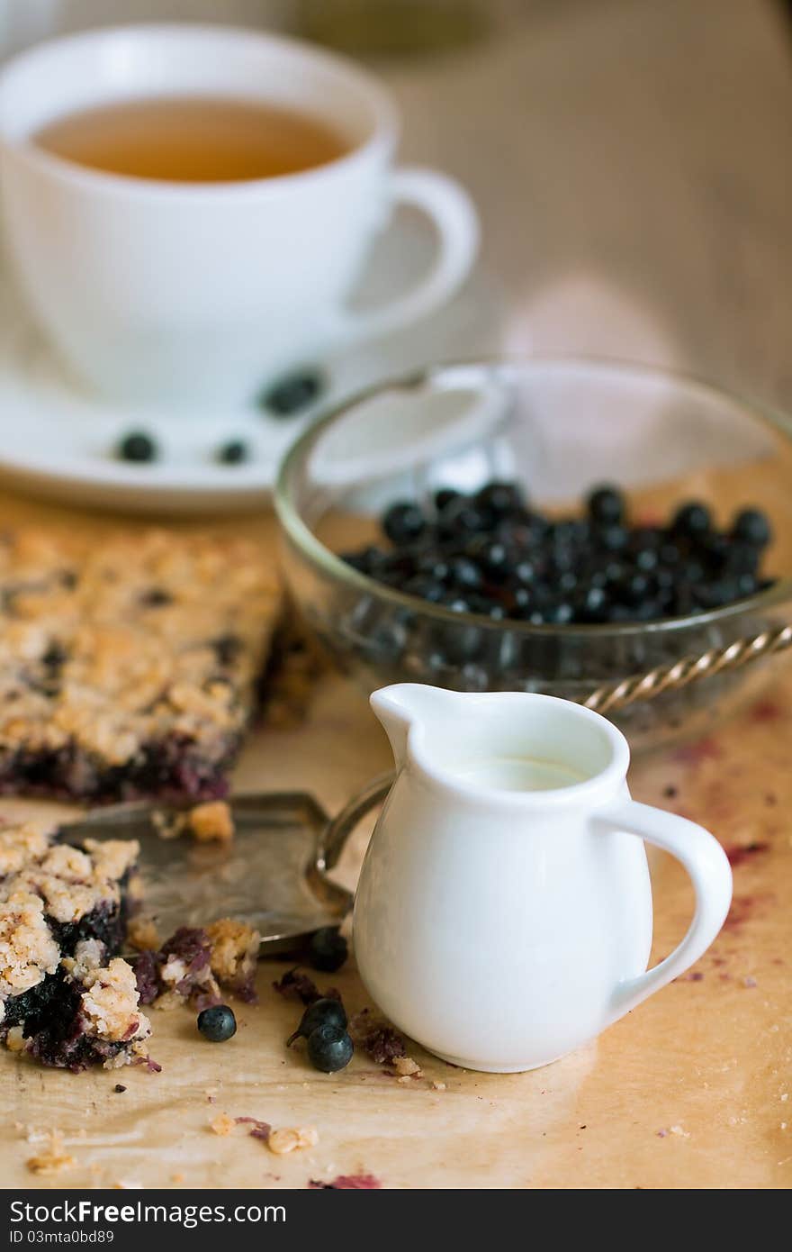 White Jug Of Milk And Blueberry Pie