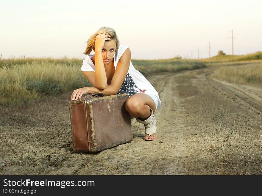 Pretty girl with a suitcase