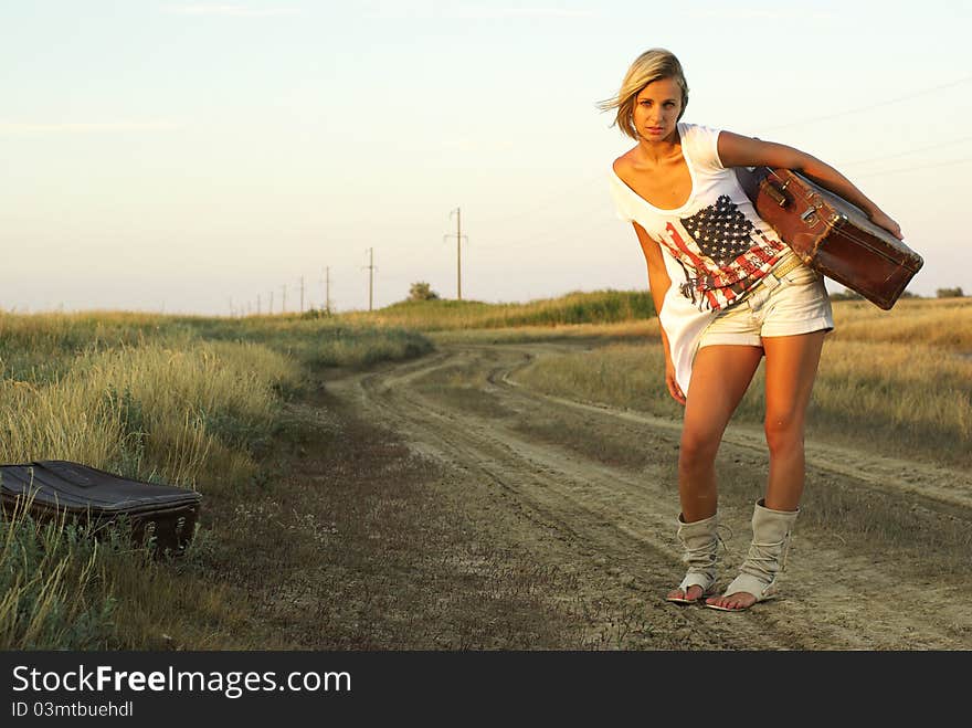 Pretty girl with a suitcase