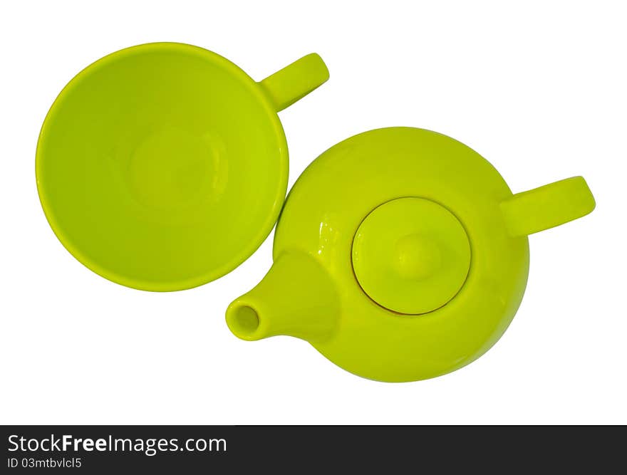 Photo of green ceramic teapot and empty cup isolated on a white background, WITH CLIPPING PATH. Photo of green ceramic teapot and empty cup isolated on a white background, WITH CLIPPING PATH