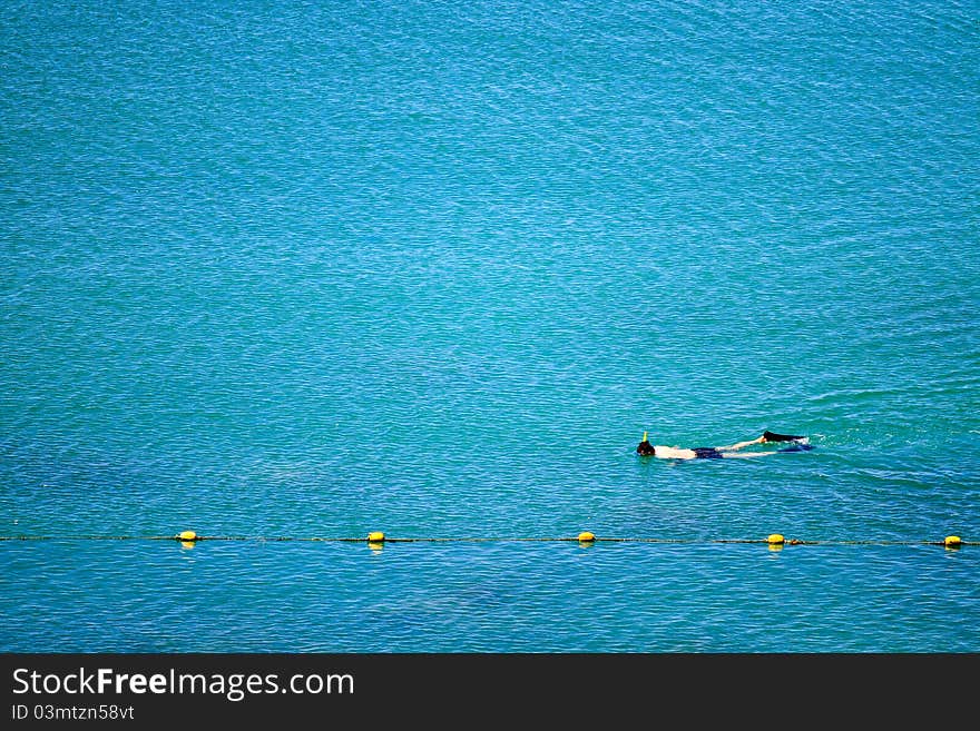 Snorkeling alone in the sea