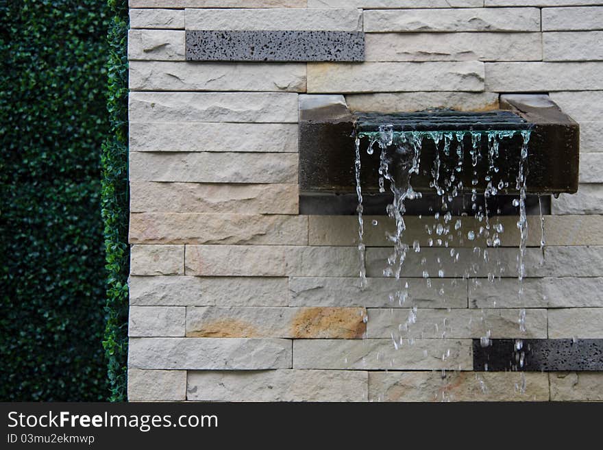 Fountain on wall in the villa