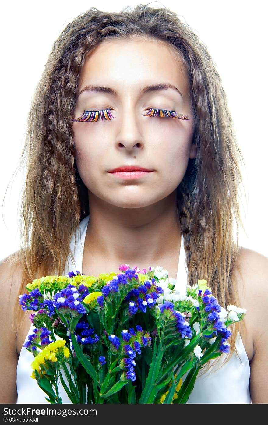 Beautiful woman face with flowers - on white background. Beautiful woman face with flowers - on white background