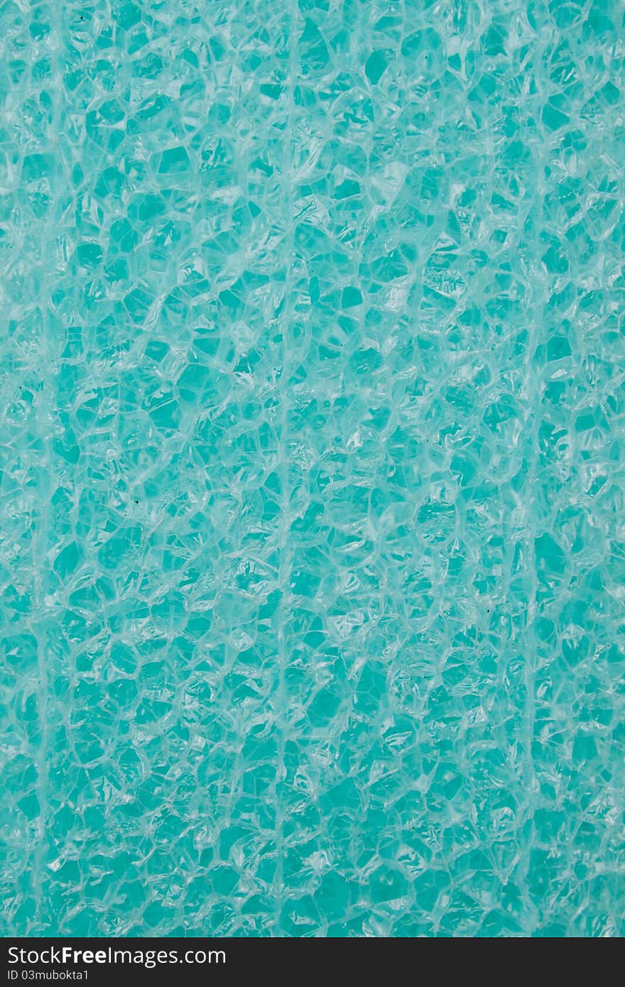 background green sponge texture close up. background green sponge texture close up