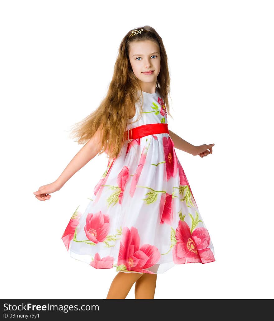 Little girl in red dress on white background