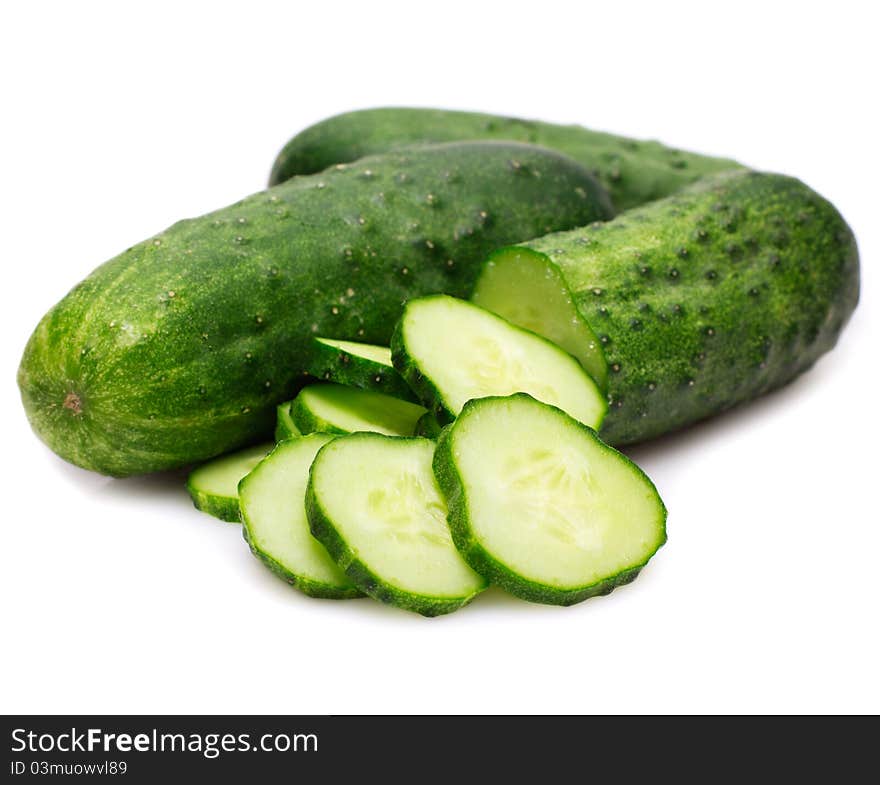 Fresh cucumbers on white