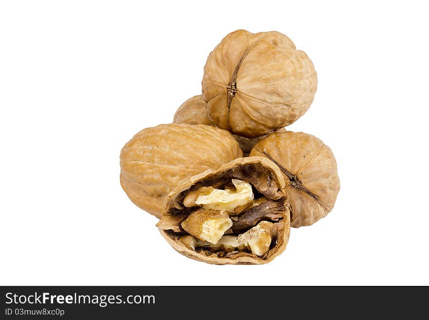 Pile of walnuts isolated on a white background.