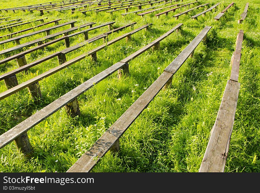 Old wooden bench and grass