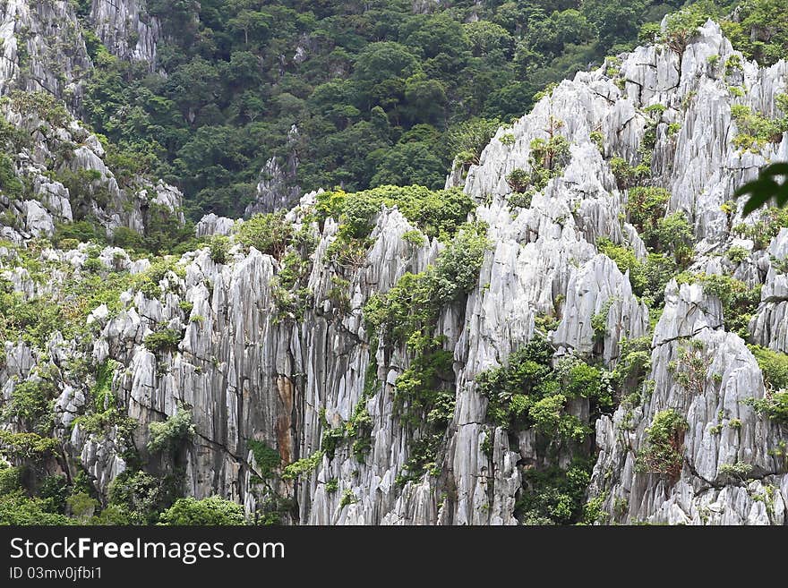 Image of ancient limestone hills in Saraburi, Thailand.