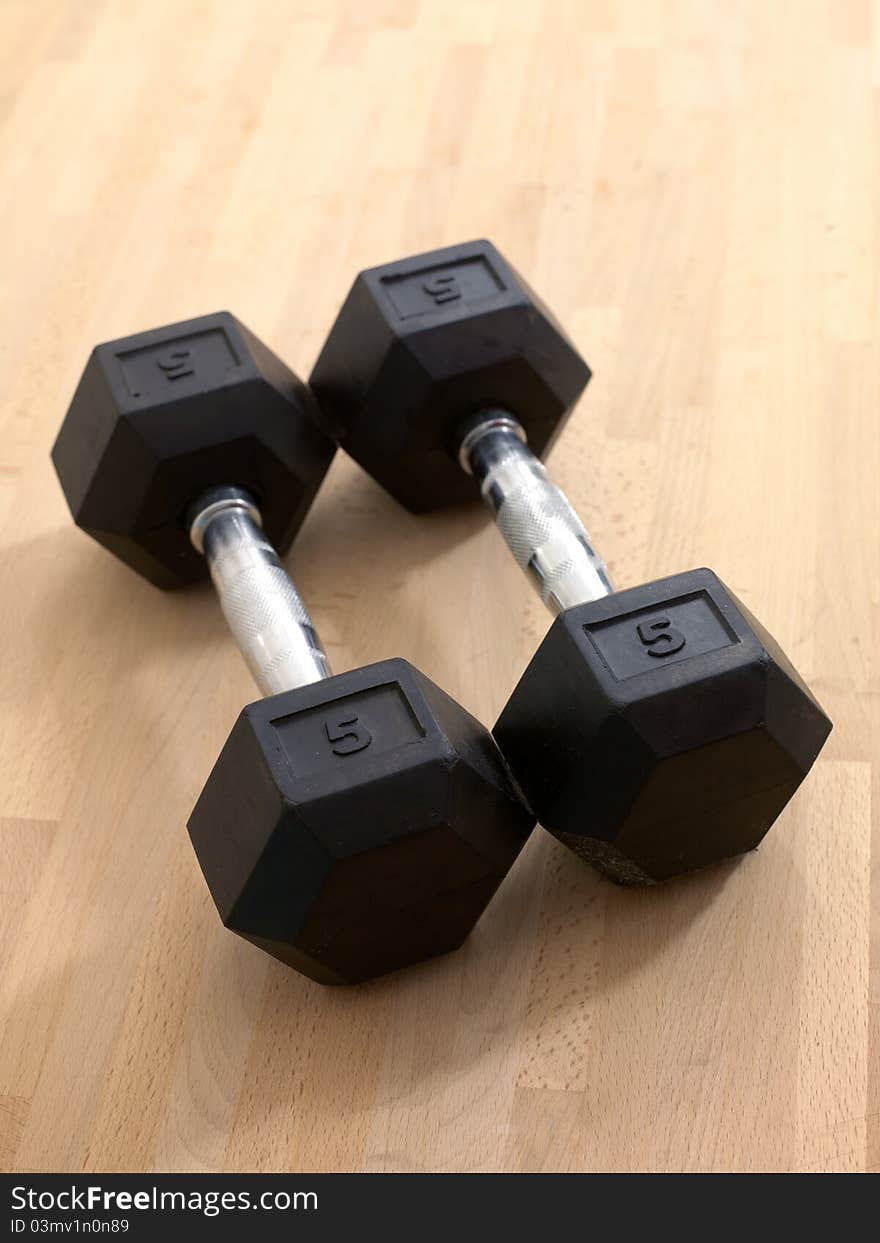 Gym weights on the floor at a gym