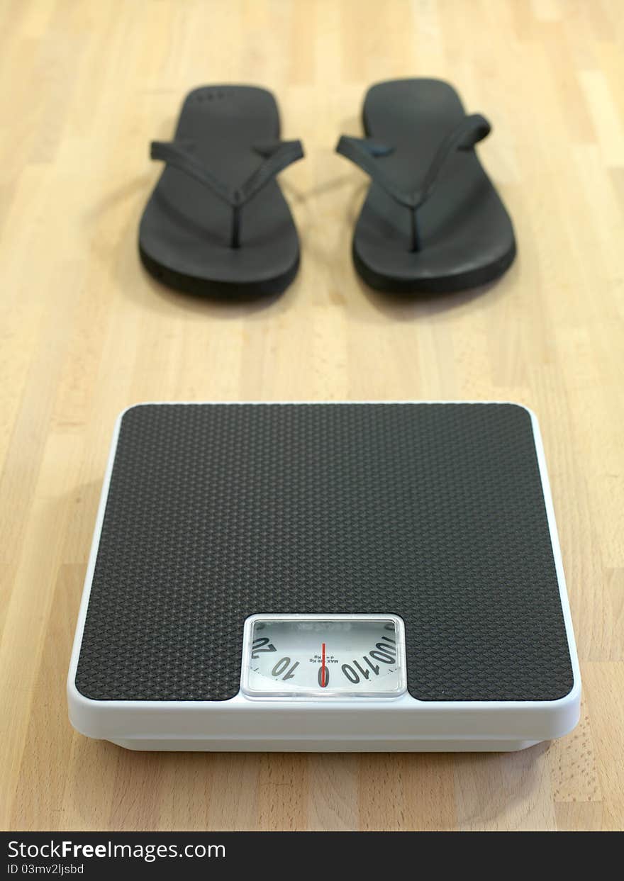 Bathroom scales against a white background. Bathroom scales against a white background