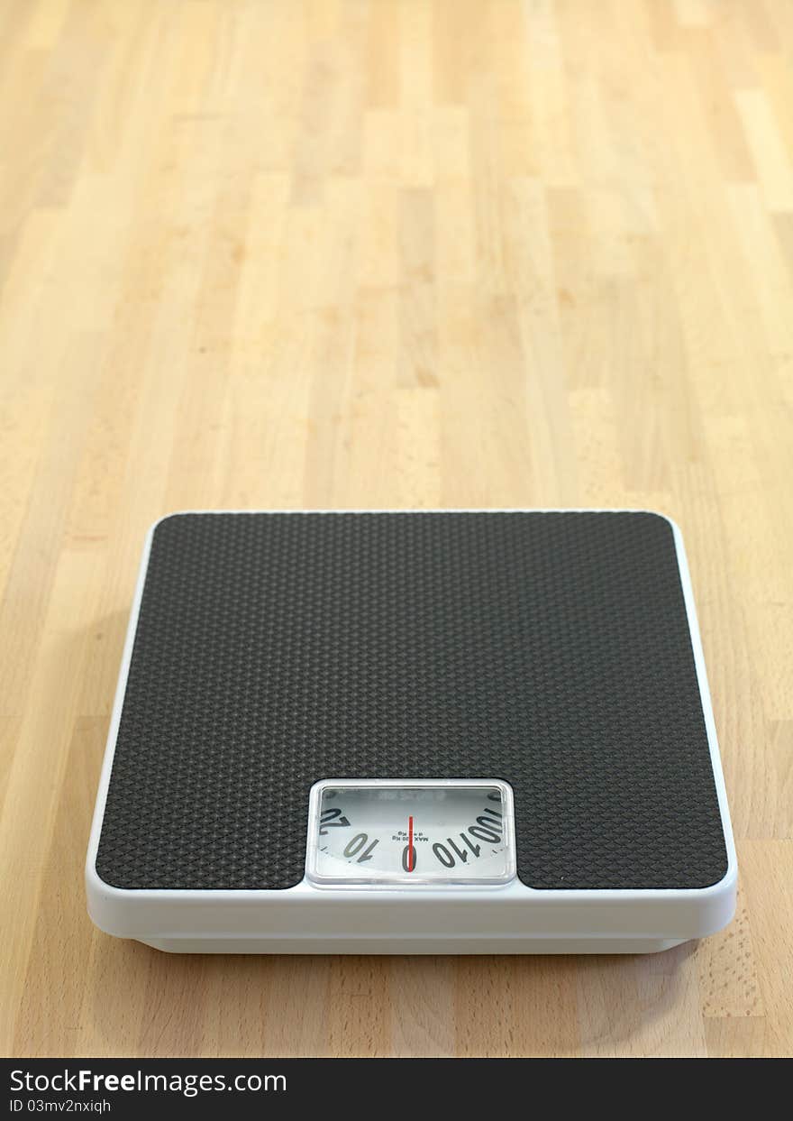 Bathroom scales against a white background. Bathroom scales against a white background