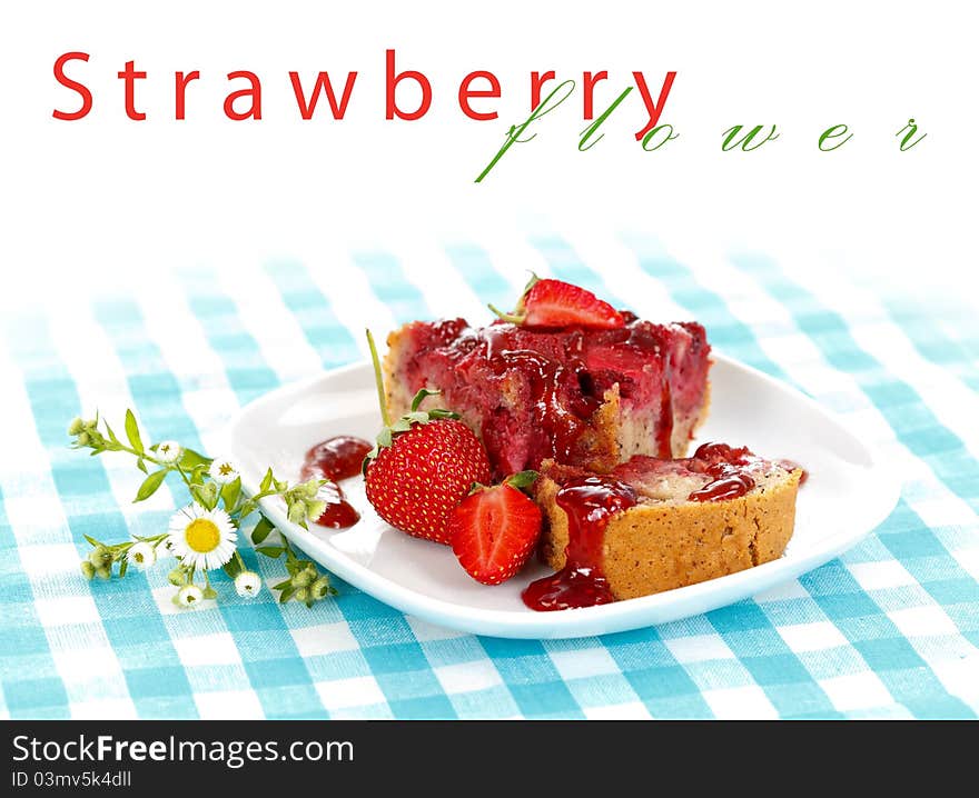 Strawberry cake with jam and fruits on the tablecloth with place for your text