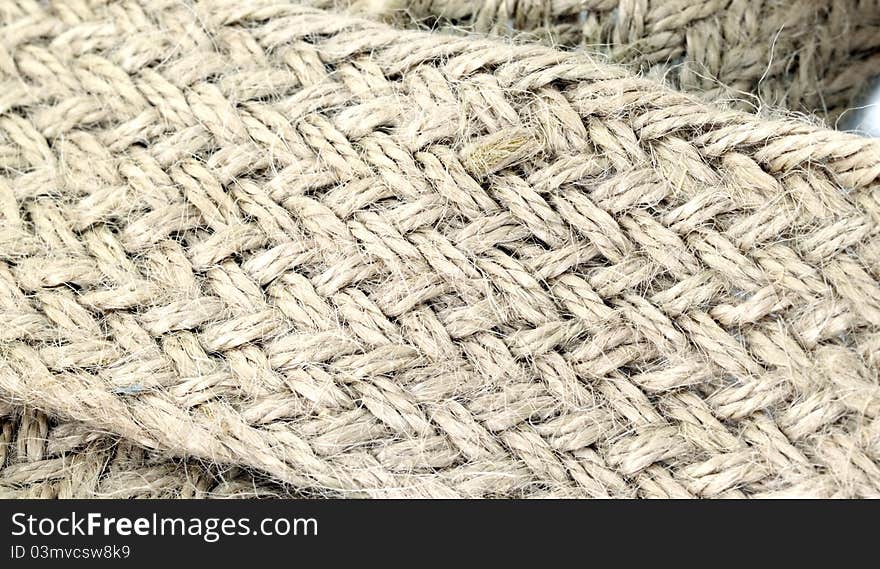 Brown twine that weaving as braid. Brown twine that weaving as braid