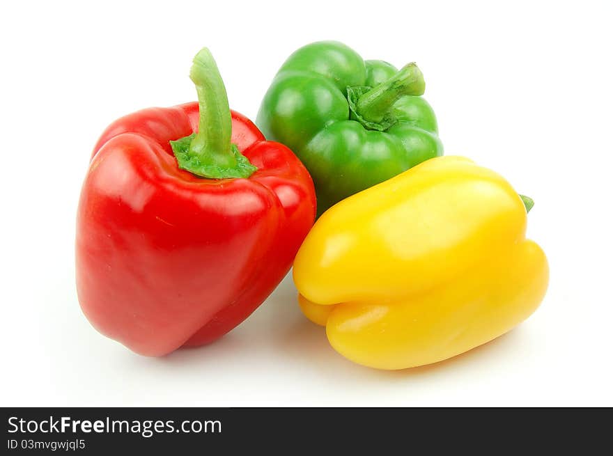 Three peppers on white background. Three peppers on white background