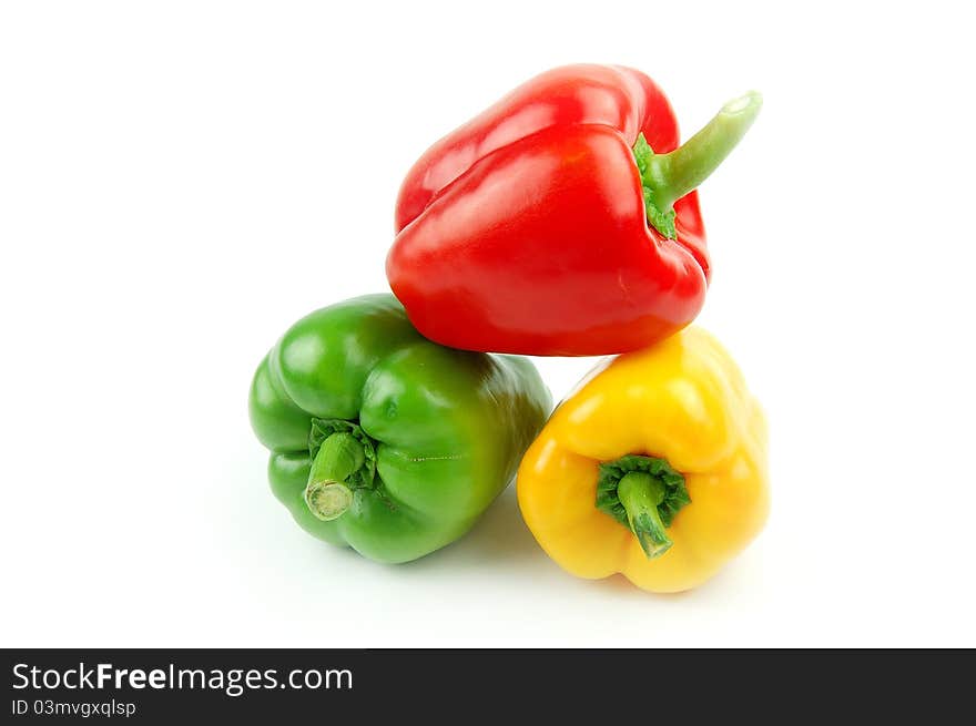 Three peppers on white background. Three peppers on white background