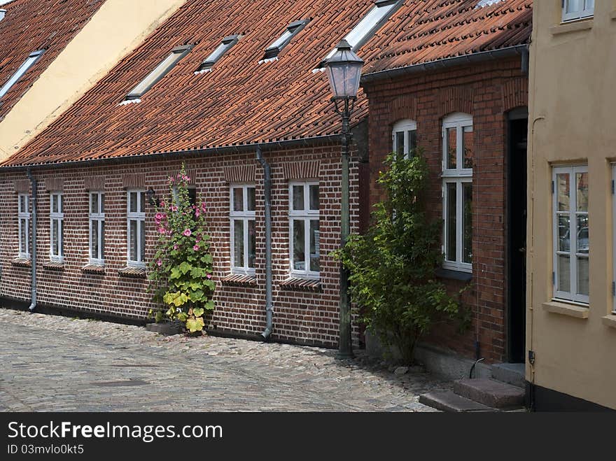 Street with old houses from royal town Ribe in Denmark.