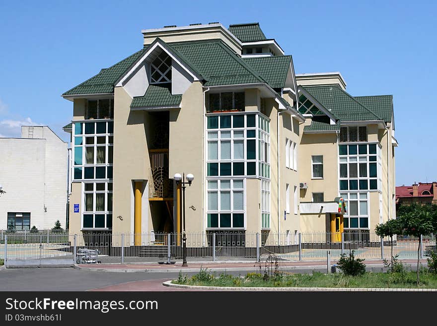 New modern house with green roof. New modern house with green roof