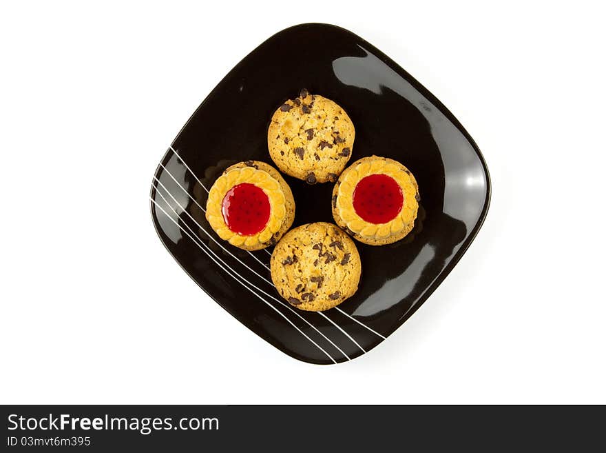 Plate of cookies isolated on white background