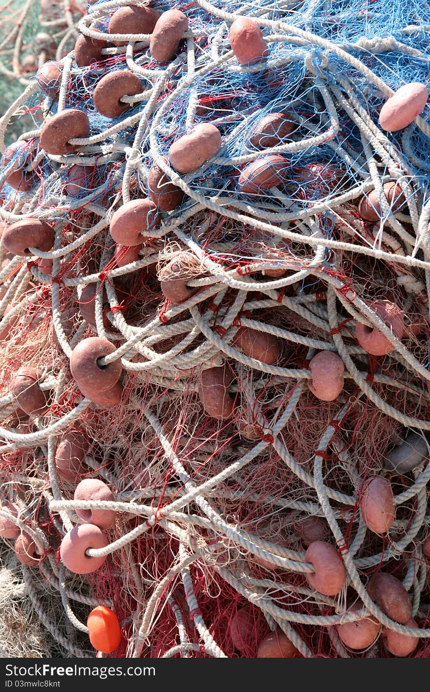 Bunch of fishing nets of various colors