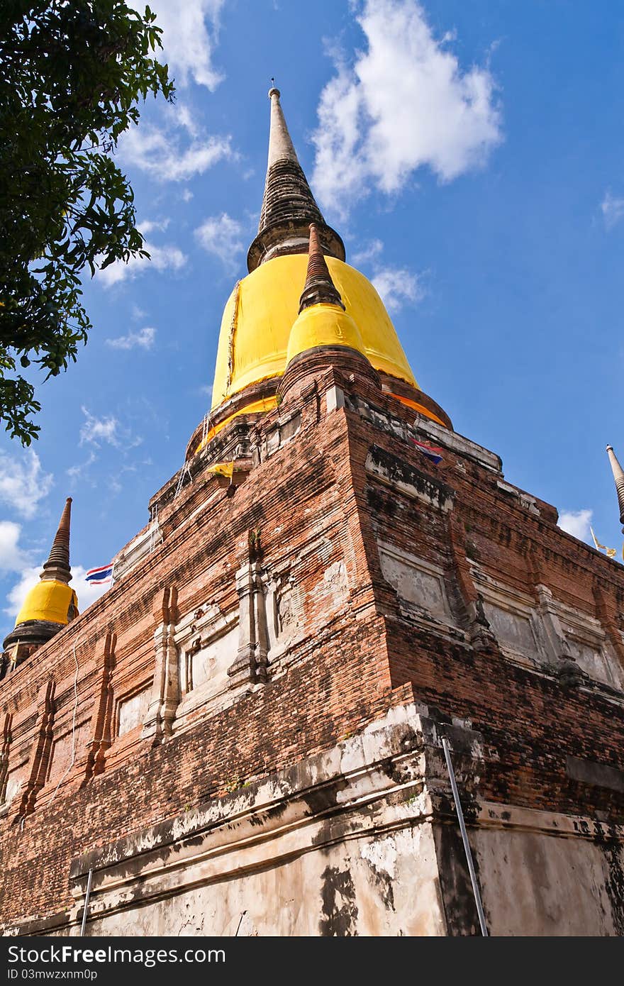 Ruin pagodas in Ayutthaya Thailand with blue sky from bottom. Ruin pagodas in Ayutthaya Thailand with blue sky from bottom