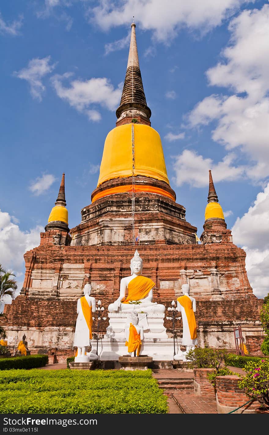 Buddha statues in front of ruin pagodas in park in Ayutthaya Thailand. Buddha statues in front of ruin pagodas in park in Ayutthaya Thailand