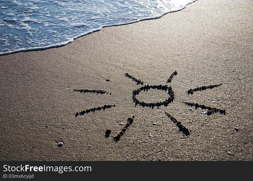 Sun outline on the wet sand