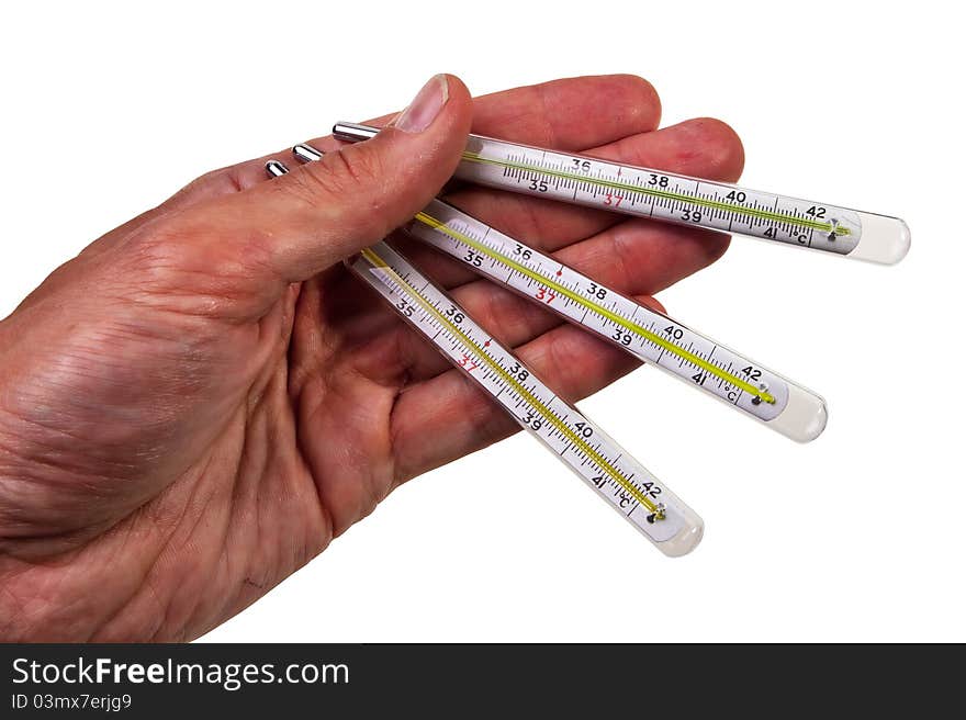 Three glass mercury thermometers hold by male hand isolated over white background. Three glass mercury thermometers hold by male hand isolated over white background.