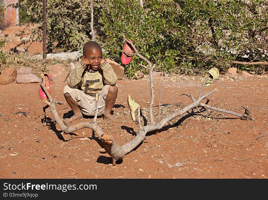 Poor African little boy from Mochudi village, Botswana