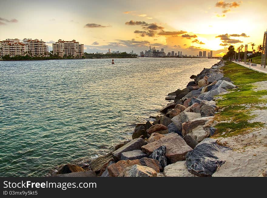 Sunset over city and ocean