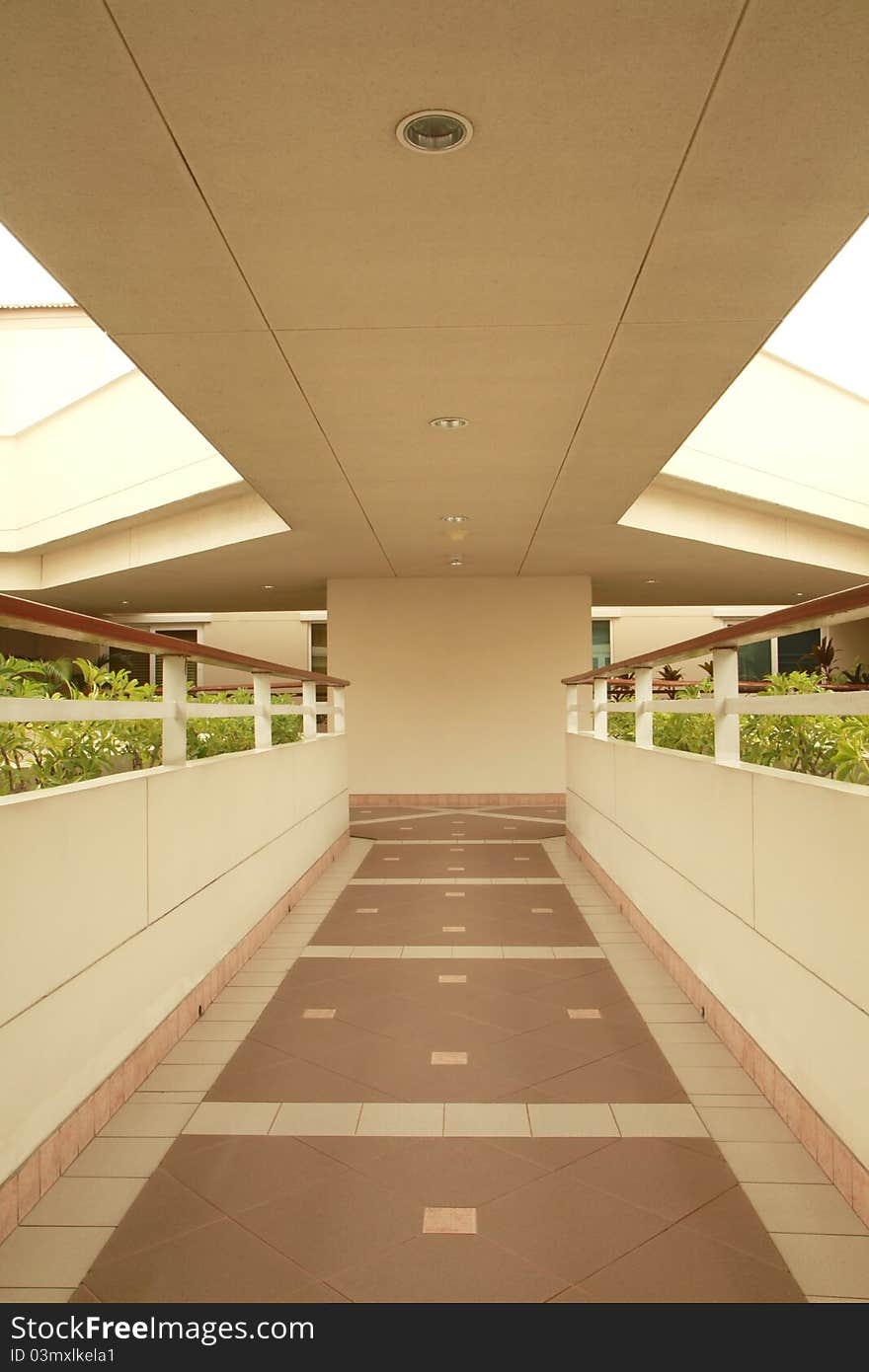 Long corridor between building decorated with beautiful tiles