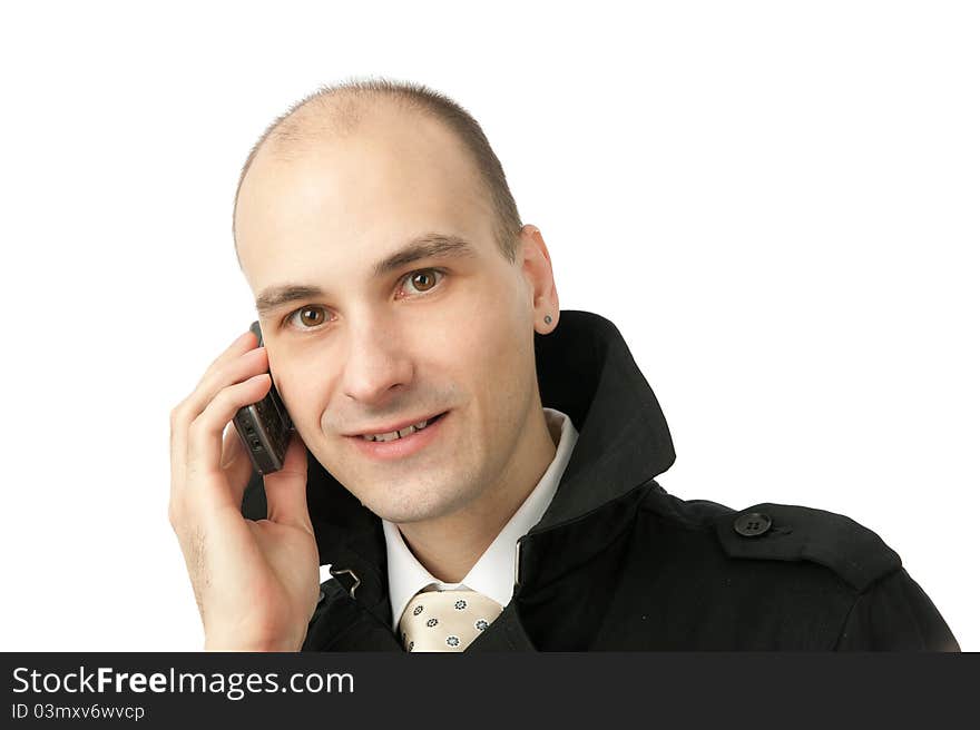 Young business man on the phone, isolated on white