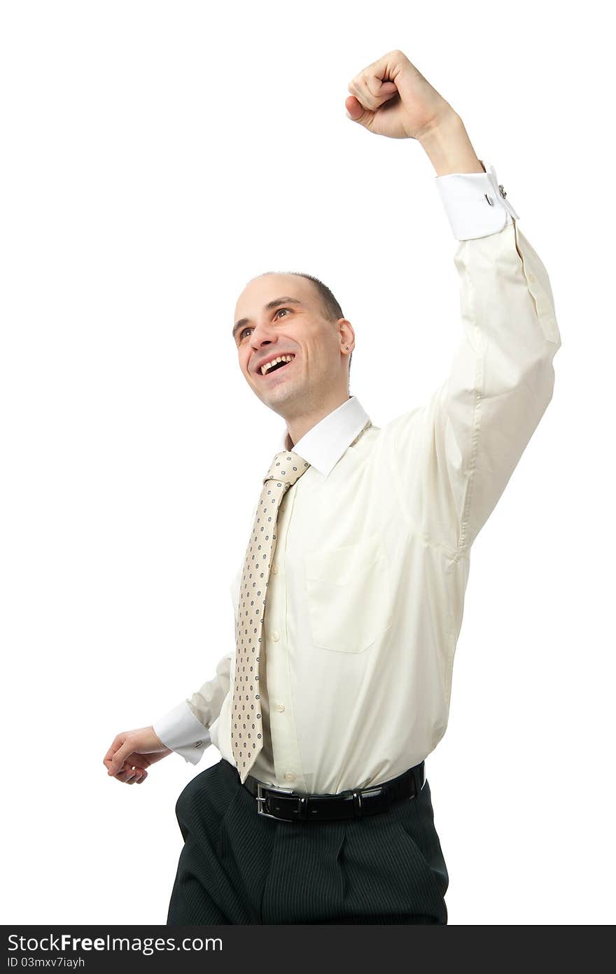 Excited handsome business man with arm raised