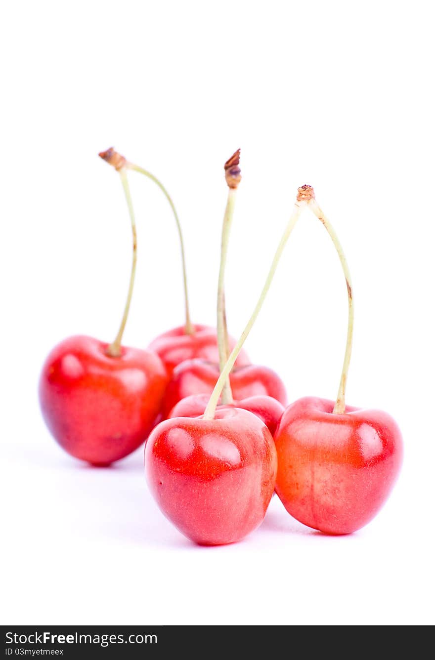 Fresh raw red merrys on white background