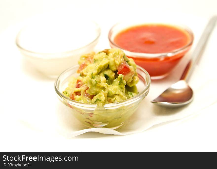 Nachos dips in glass bowls