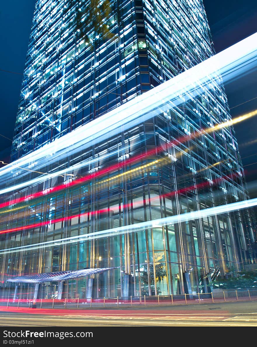 Traffic night in modern commercial building at night. Traffic night in modern commercial building at night