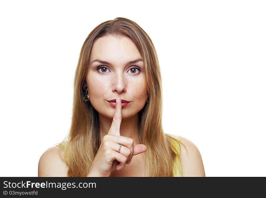 Young Woman Gesturing for Quiet. Isolated.