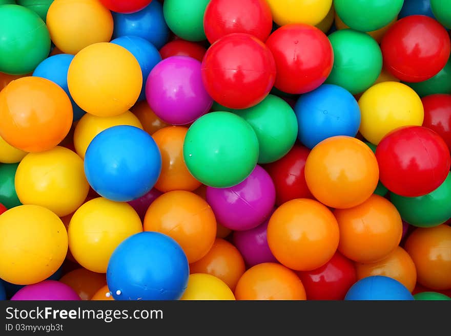 Pile of colorful little balls for children to play around