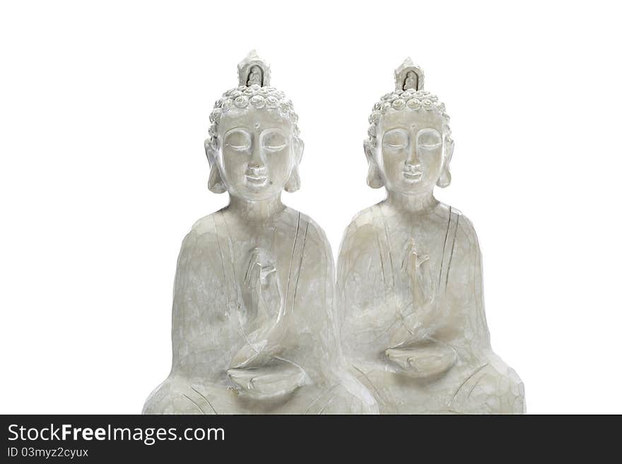 Two wooden budha statues, closeup