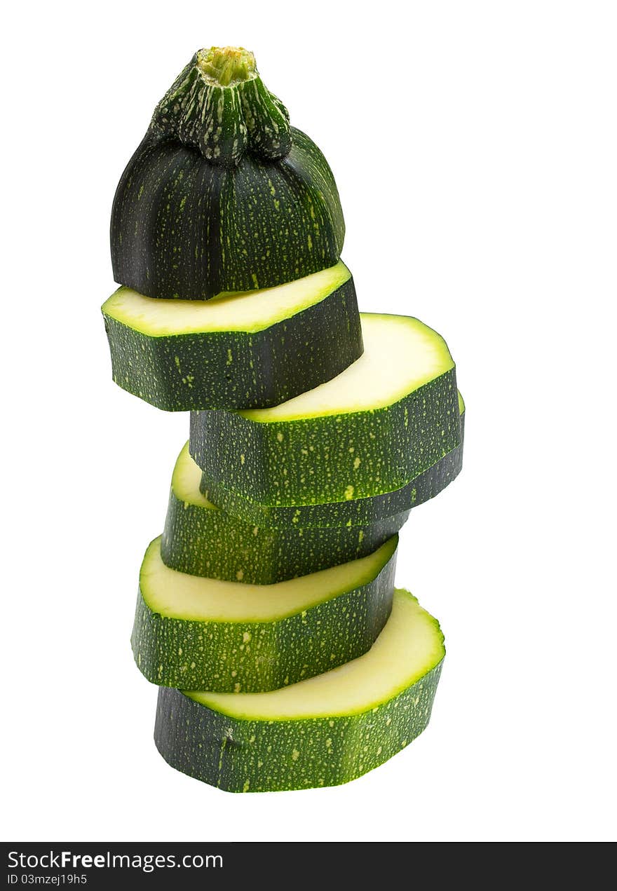 Fresh green zucchini on white