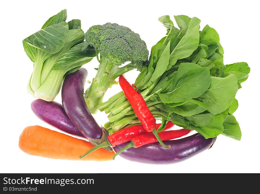 Assortment Of Green Vegetables, Carrots, Chili And Eggplants. Assortment Of Green Vegetables, Carrots, Chili And Eggplants