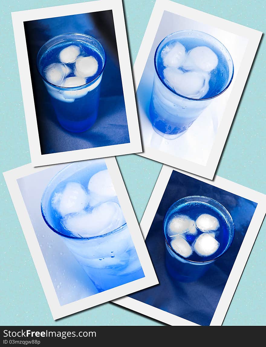 Blue glasses of water with ice-cubes on a blue background. Blue glasses of water with ice-cubes on a blue background