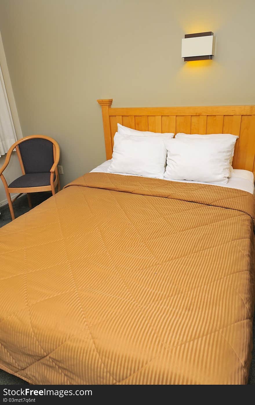 Simple looking generic single bed with clean bedsheets. Simple looking generic single bed with clean bedsheets.