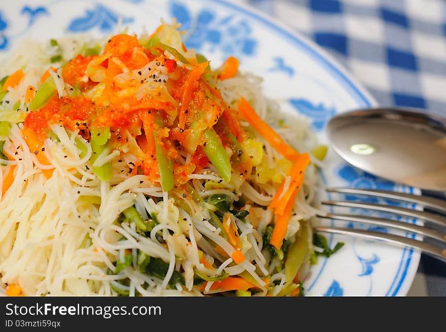 Healthy Chinese style vermicelli topped with spicy seasonings. Healthy Chinese style vermicelli topped with spicy seasonings.