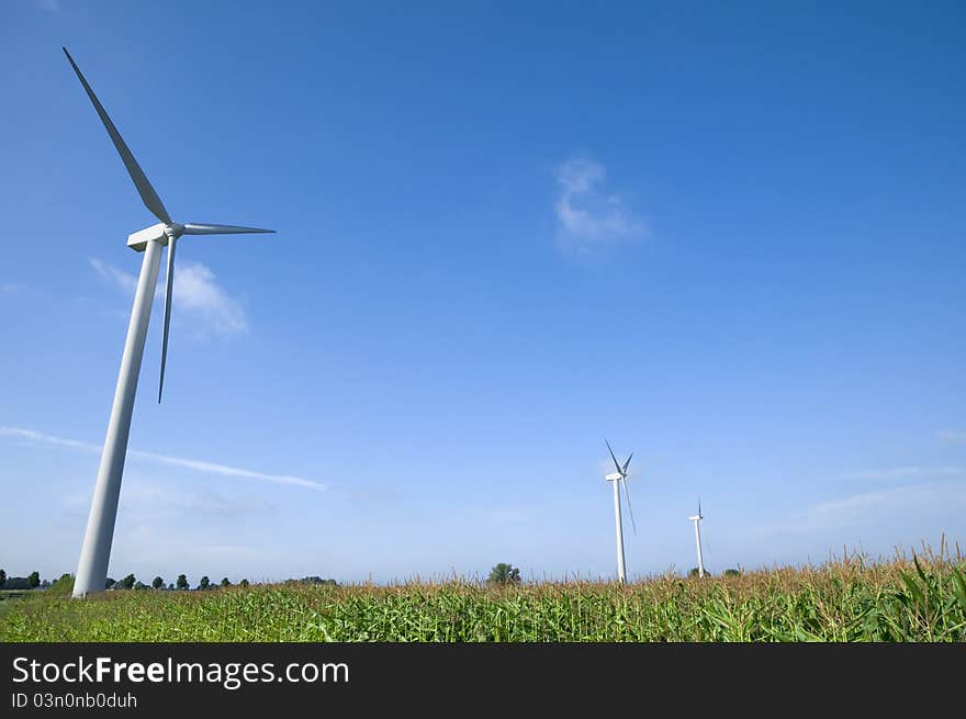 Wind turbines in green field